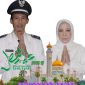 Kades Lagan Tengah, Asrofin, S.Pd Beserta Istri. Foto : ist